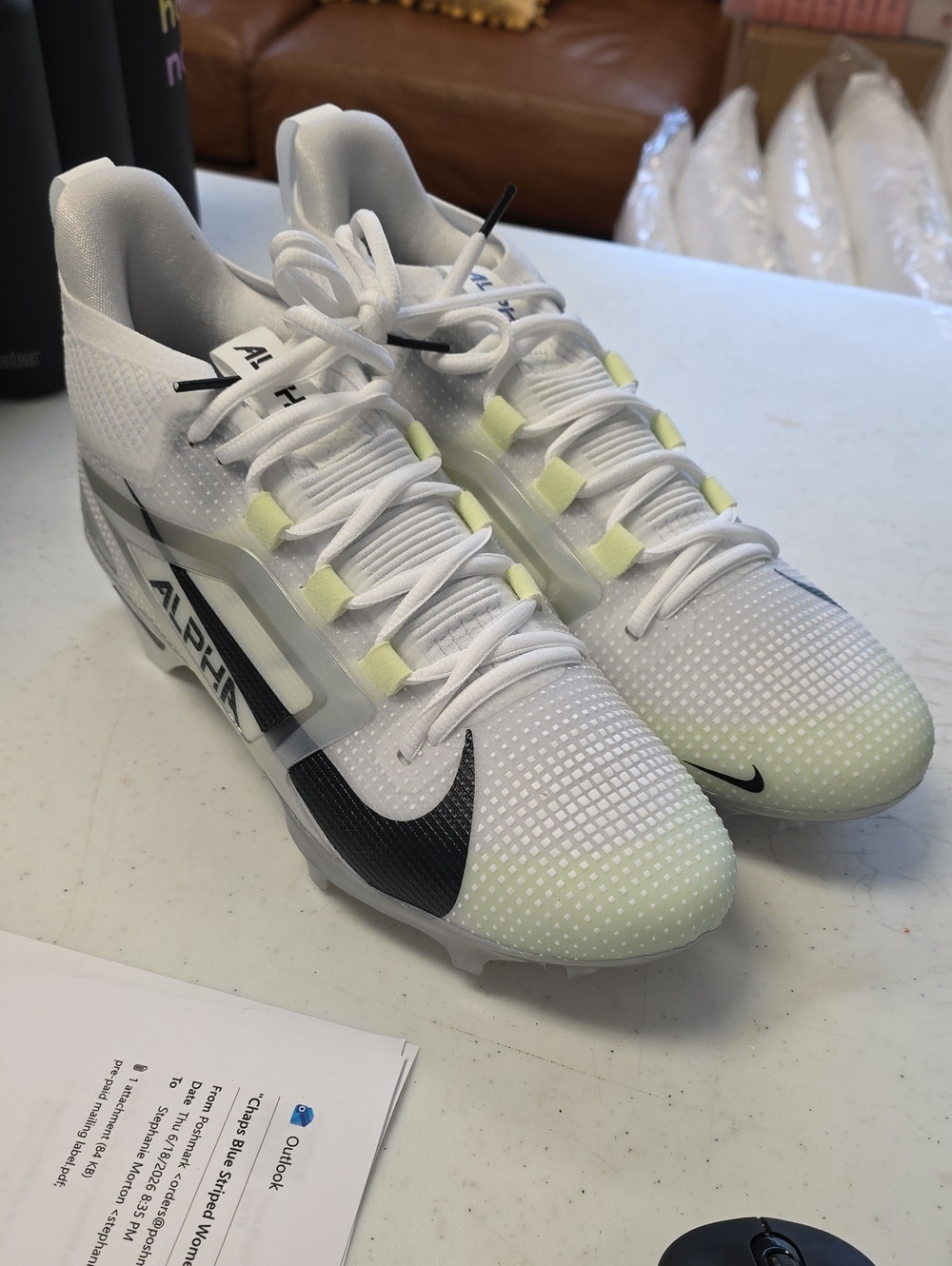 Nike Men’s White Menace 4 Elite Cleats with Black Swoosh and Pale Yellow Accents